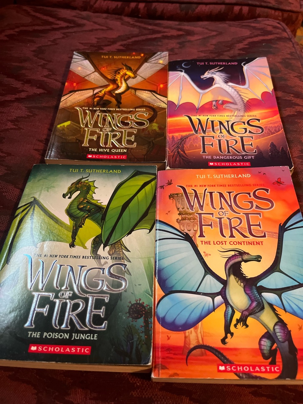 Scholastic Wings of Fire Paperback Set — Green, Orange, Purple, Blue Covers